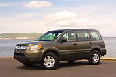 AUT 15 RK1031 01
2006 Honda Pilot LX Green Low 3/4 Side View On Pavement By Water