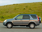 AUT 15 RK1041 01
2006 Honda CR-V Gray Profile Shot On Pavement Grass Hills Background