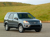 AUT 15 RK1042 01
2006 Honda CR-V Gray 3/4 Front View On Pavement Grass Hills Background