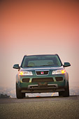 AUT 15 RK1082 01
2007 Saturn Vue Hybrid Green Low Head On View On Pavement