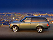 AUT 15 RK1096 01
2007 Land Rover Range Rover Supercharged Green Profile View On Pavement City Background