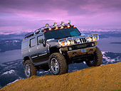 AUT 15 RK1110 01
2007 Hummer H2 Black Low 3/4 Front View On Dirt Hill