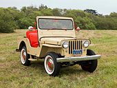 AUT 15 RK1117 01
1962 Willys Jeep DJ 3A Tan 3/4 Front View On Grass