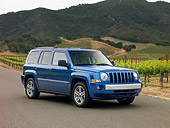 AUT 15 RK1126 01
2007 Jeep Patriot Blue 3/4 Front View On Pavement By Vineyard