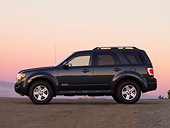 AUT 15 RK1151 01
2010 Ford Escape Hybrid SUV Black Side View On Pavement At Sunset