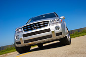 AUT 15 RK1155 02
2007 Mercedes-Benz ML63 AMG SUV Silver Low Head On View On Pavement