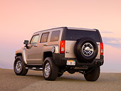 AUT 15 RK1156 01
2007 Hummer H3 Silver 3/4 Rear View On Pavement At Dusk