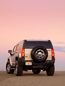 AUT 15 RK1157 01
2007 Hummer H3 Silver 3/4 Rear View On Pavement At Dusk