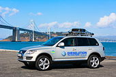 AUT 15 RK1167 01
2008 Volkswagen Touareg TDI Silver 3/4 Front View On Pavement By Bridge Water Sky