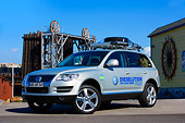 AUT 15 RK1171 01
2008 Volkswagen Touareg TDI Silver 3/4 Front View On Pavement By Bridge Building Sky