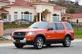AUT 15 RK1185 01
2008 Ford Explorer Ironman Orange 3/4 Front View By House