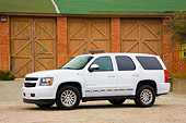AUT 15 RK1191 01
2008 Chevrolet Tahoe Hybrid SUV White 3/4 Front View By Garage