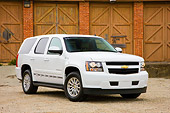AUT 15 RK1192 01
2008 Chevrolet Tahoe Hybrid SUV White 3/4 Front View By Garage