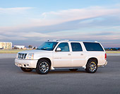 AUT 15 RK1202 01
2004 Cadillac Escalade ESV White 3/4 Front View Cloudy Sky