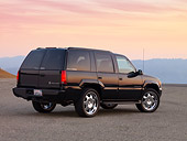 AUT 15 RK1211 01
2000 Cadillac Escalade Black 3/4 Rear View On Pavement At Dusk