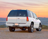 AUT 15 RK1213 01
2000 Cadillac Escalade White 3/4 Rear View On Pavement At Dusk