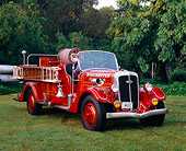 AUT 16 RK0119 04
1935 Ahrens-Fox 650 GPM Pumper 3/4 Front View On Grass