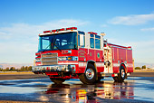 AUT 16 RK0173 01
2009 Pierce Quantum Pumper 1500 GPM Fire Truck 3/4 Front View On Wet Pavement