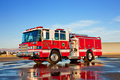 AUT 16 RK0175 01
2009 Pierce Quantum Pumper 1500 GPM Fire Truck 3/4 Front View On Wet Pavement