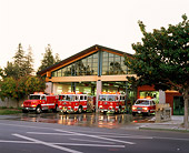 AUT 16 RK0002 03
Four Fire Trucks Red 3/4 View By Fire Station