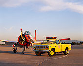 AUT 16 RK0014 07
1986 Dodge Power Ram Pick Up Fire Truck 3/4 Front View By Airplane