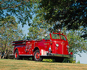 AUT 16 RK0040 09
1954 American LaFrance 700 Series Firetruck 3/4 Side View On Grass By Trees