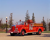 AUT 16 RK0075 02
1951 Mack Fire Truck 3/4 Front View On Pavement Blue Sky