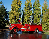 AUT 16 RK0079 09
1952 K.W. Van Pelt Fire Truck 3/4 Side View On Wet Pavement Trees