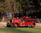 AUT 16 RK0092 03
1931 Mack Fire Truck 3/4 Front View On Grass By Trees