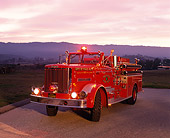 AUT 16 RK0097 06
1961 Oshkosh 120 GPM Pumper Front 3/4 View On Pavement At Dusk
