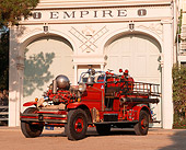AUT 16 RK0102 11
1929 Ahrens-Fox Fire Truck Front 3/4 View In Front Of Fire Station