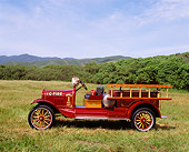 AUT 16 RK0110 08
1923 Ford Model T Chemical Hose Fire Truck Profile View On Grass