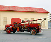 AUT 16 RK0139 03
1927 American La France Deluge Truck Red 3/4 Rear View On Pavement By Building