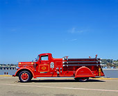 AUT 16 RK0141 03
1935 Ward La France Fire Truck Side View On Pavement Blue Sky