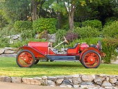 AUT 17 RK0206 01
1913 Stutz Bearcat Red Profile View On Grass By Stone Wall And Trees