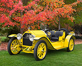 AUT 17 RK0207 01
1915 Stutz Bearcat Yellow 3/4 Front View On Grass By Autumn Trees