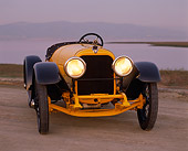 AUT 17 RK0021 03
1918 Mercer Raceabout Yellow 3/4 Front View On Dirt By Water At Dusk