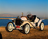 AUT 17 RK0027 02
1914 Ford Model T Speedster White 3/4 Front view On Dry Grass By Water