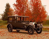 AUT 17 RK0067 06
1917 Pierce Arrow Model 66 Town Car 3/4 Front View On Pavement By Fall Trees