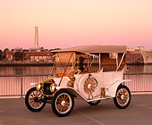 AUT 17 RK0114 03
1912 Ford Model T Touring White 3/4 Side View On Pavement By Water Filtered
