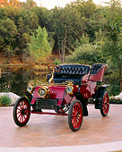 AUT 17 RK0121 03
1903 Ford Model A Runabout Burgundy 3/4 Front View On Tile Floor By Water