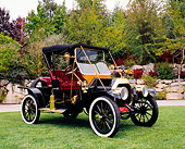 AUT 17 RK0132 03
1911 Overland Model 49 Mother-In-Law Roadster 3/4 Front View On Grass By Trees