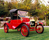 AUT 17 RK0133 02
1911 Ford Model T Torpedo Red And Black 3/4 Front View On Grass By Trees