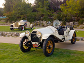 AUT 17 RK0167 01
1914 Mitchell Big Six Speedster White Front 3/4 View On Grass By 1932 Auburn