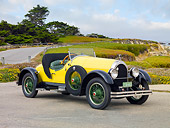 AUT 18 BK0003 01
1924 Kissel 6-55 Speedster Yellow 3/4 Front View On Pavement By Beach