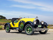 AUT 18 BK0005 01
1924 Kissel 6-55 Speedster Yellow 3/4 Front View On Pavement By Beach