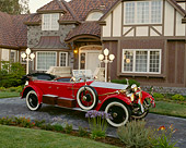 AUT 18 RK0015 04
1925 Rolls Royce Phantom I Red Convertible 3/4 Front View On Driveway By House