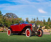 AUT 18 RK0052 05
1925 Hispano Suiza Skiff Red Low 3/4 Front View On Grass By Trees