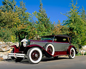 AUT 18 RK0090 02
1929 Rolls Royce P1 Burgundy And Silver Low 3/4 Side View On Pavement By Trees