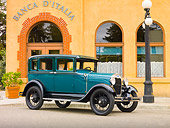 AUT 18 RK0747 01
1929 Ford Model A Town Sedan Green 3/4 Front View On Pavement By Building